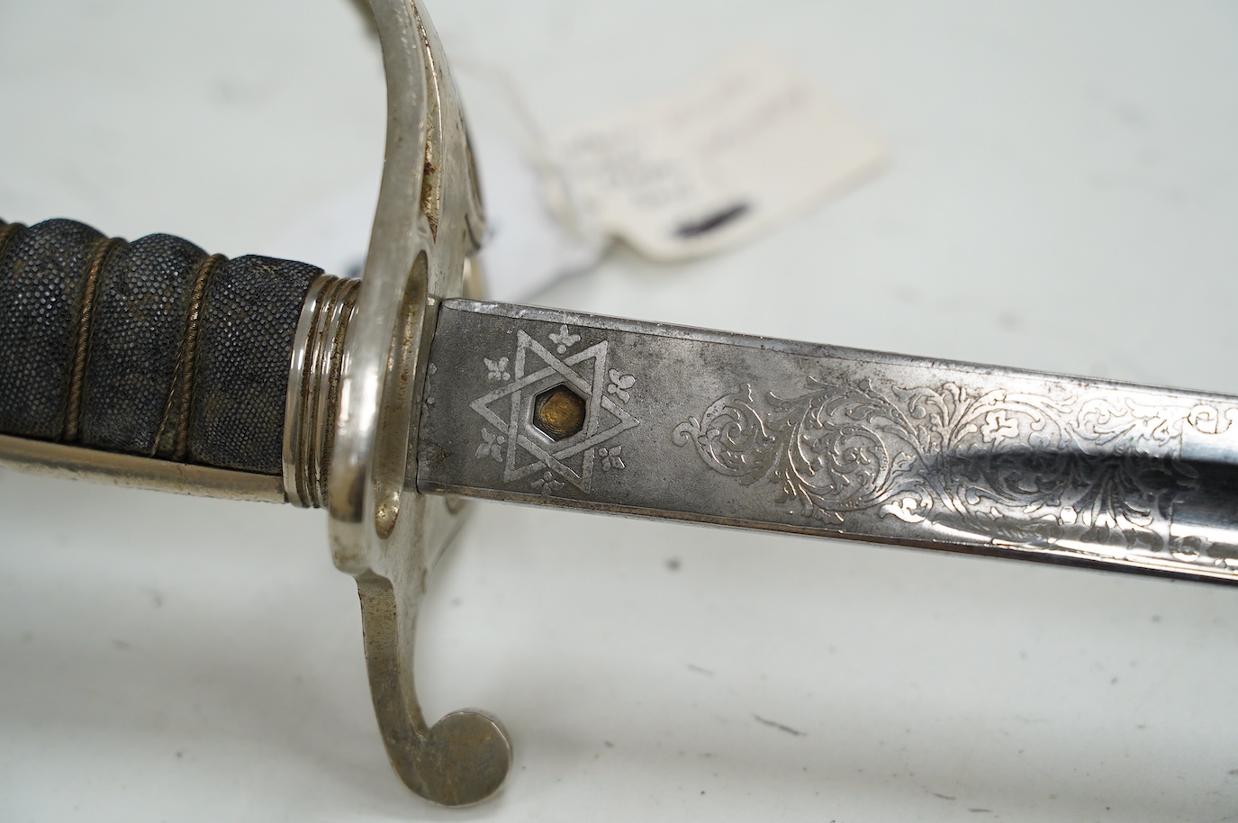 A George VI Royal Artillery officer’s sword, regulation etched blade and plated triple bar guard, blade 85.5cm. Condition - good